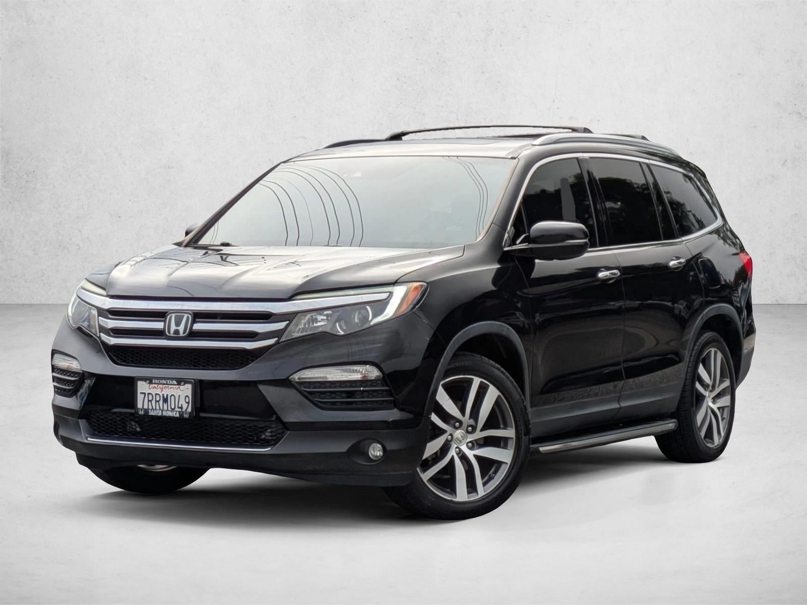 2016 Honda Pilot AWD 4dr Elite with DVD Rear Entertainment System and Navigation